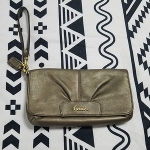 Bronze authentic Coach wristlet